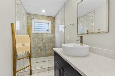 bathroom featuring tile patterned floors and vanity