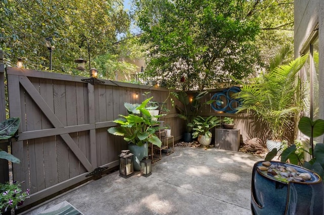 46 Ivy Rdg NE, Atlanta, GA 30342 - fenced backyard with a patio area