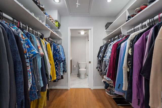 46 Ivy Rdg NE, Atlanta, GA 30342 - walk in closet featuring wood finished floors