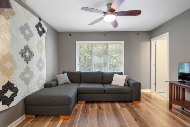 46 Ivy Rdg NE, Atlanta, GA 30342 - living area with baseboards, a ceiling fan, and light wood-type flooring