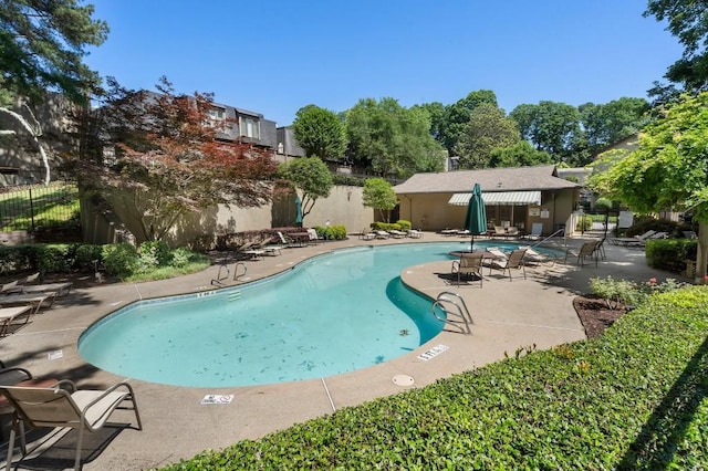 46 Ivy Rdg NE, Atlanta, GA 30342 - community pool featuring a patio