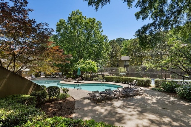 46 Ivy Rdg NE, Atlanta, GA 30342 - community pool featuring a patio