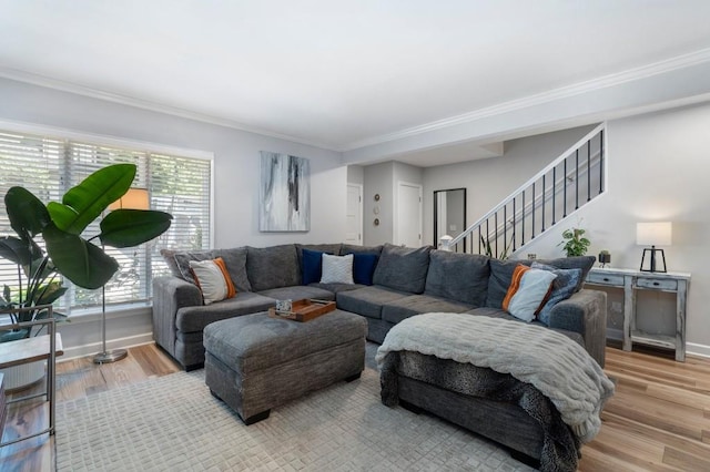 46 Ivy Rdg NE, Atlanta, GA 30342 - living area with wood finished floors, ornamental molding, baseboards, and stairs