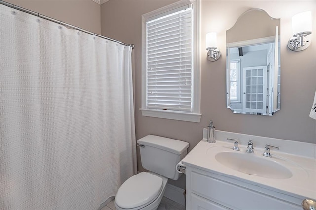 bathroom with vanity and toilet