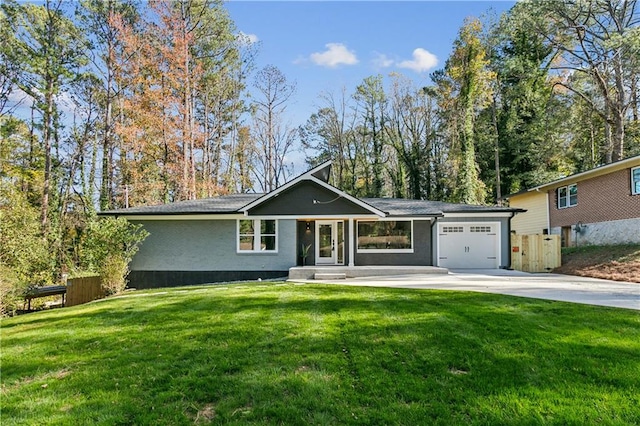 ranch-style house with a front lawn and a garage