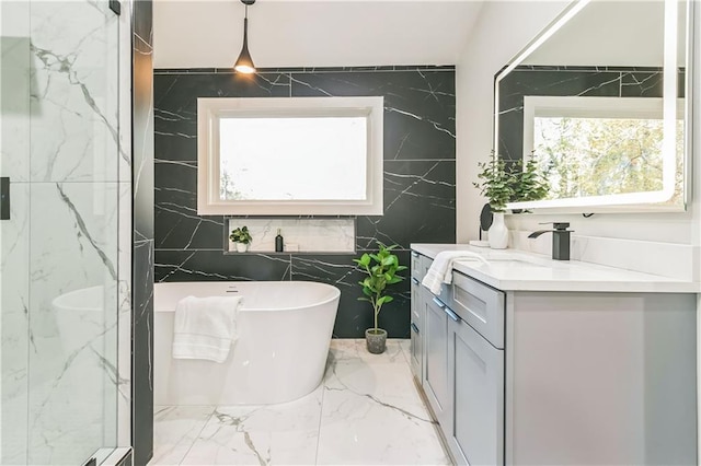 bathroom with independent shower and bath and vanity