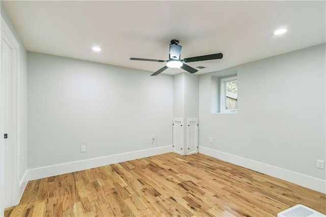 unfurnished room featuring ceiling fan and light hardwood / wood-style flooring