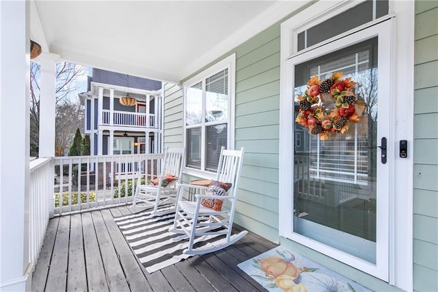 wooden deck with covered porch