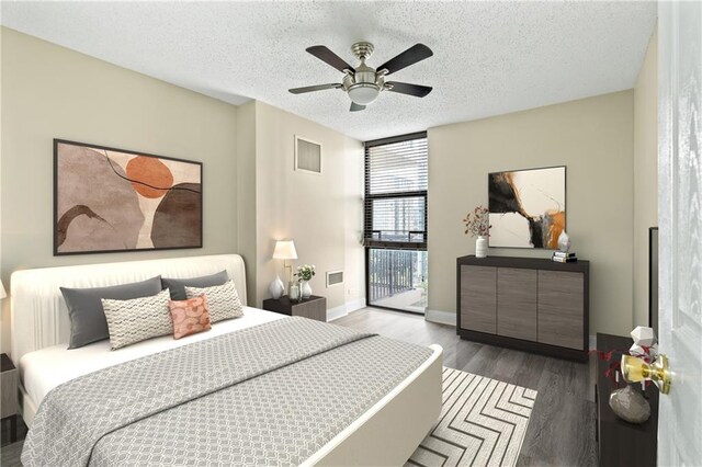 620 Peachtree St NE Unit 911, Atlanta, GA 30308 - bedroom featuring wood finished floors, a textured ceiling, and ceiling fan