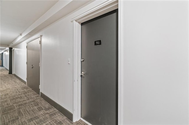 620 Peachtree St NE Unit 911, Atlanta, GA 30308 - hallway with carpet flooring and baseboards