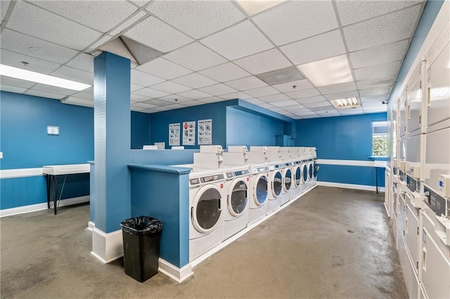 620 Peachtree St NE Unit 911, Atlanta, GA 30308 - communal laundry room featuring stacked washer and clothes dryer and washing machine and dryer