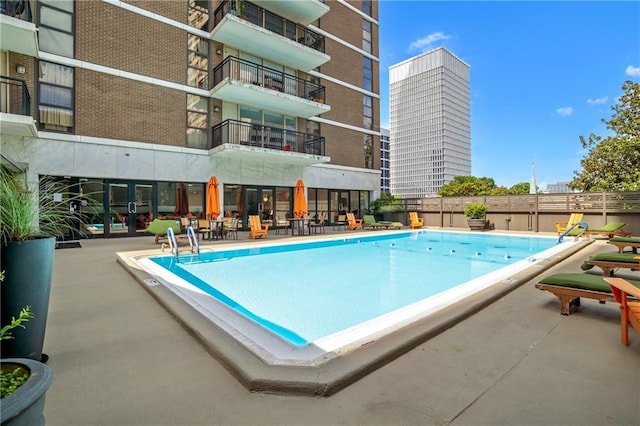 620 Peachtree St NE Unit 911, Atlanta, GA 30308 - community pool featuring a patio area