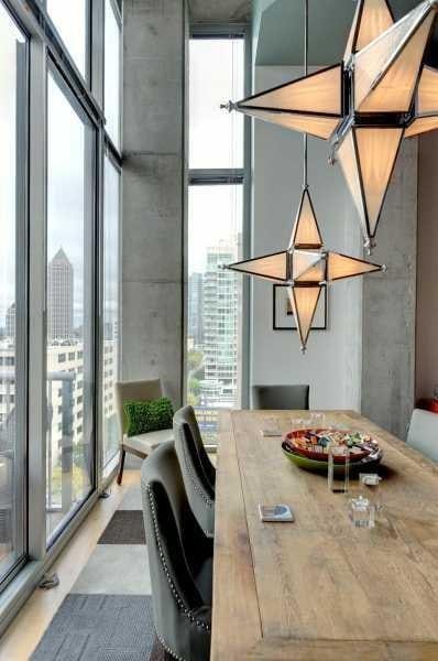 dining room with a wall of windows and plenty of natural light