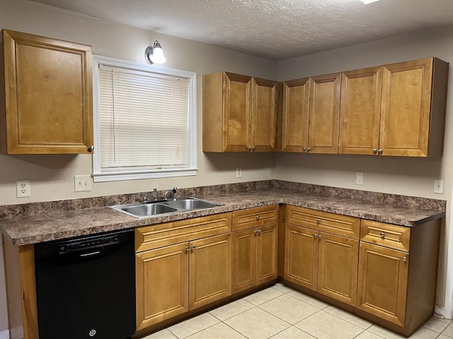 kitchen with black dishwasher, a textured ceiling, sink, and light tile patterned floors