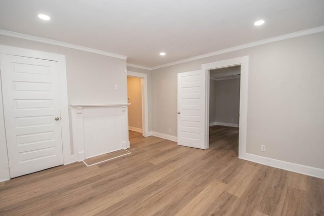 1402 Elm St, Lagrange, GA 30240 - unfurnished bedroom featuring recessed lighting, baseboards, light wood-type flooring, ornamental molding, and a closet