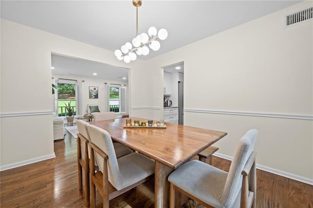 1438 Heritage Glen Dr, Marietta, GA 30068 - dining area with dark wood-style flooring, a chandelier, and recessed lighting