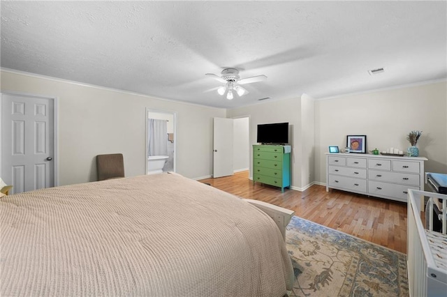 1438 Heritage Glen Dr, Marietta, GA 30068 - bedroom featuring light wood-style floors, crown molding, a ceiling fan, and ensuite bath