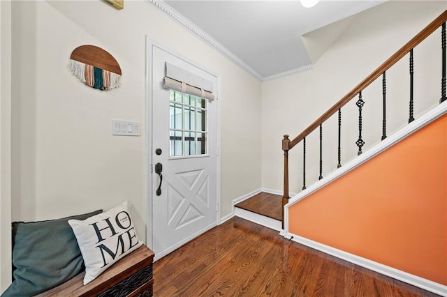 1438 Heritage Glen Dr, Marietta, GA 30068 - entrance foyer with wood finished floors, ornamental molding, and stairway