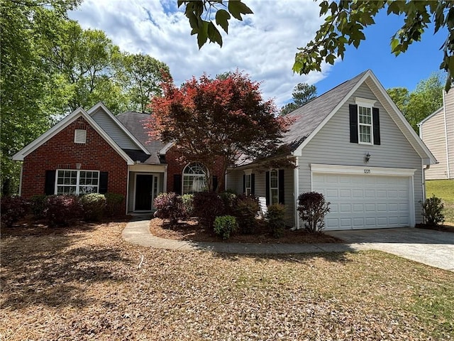 1221 St James Pl, Loganville, GA 30052 - traditional-style house with brick siding, driveway, and a garage