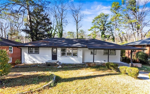 ranch-style house with a front yard