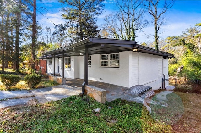 view of home's exterior featuring a porch