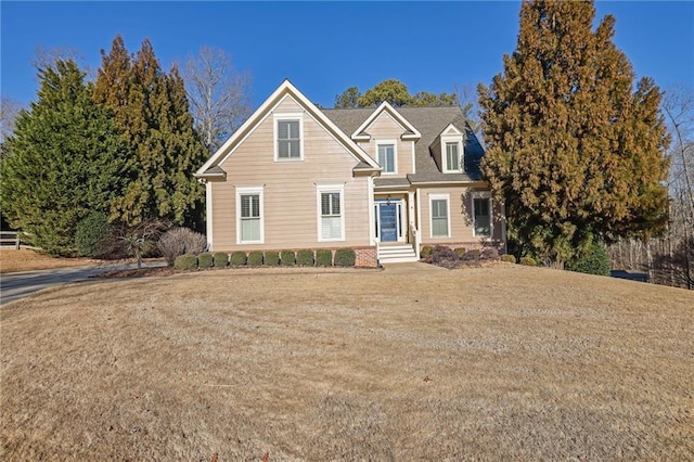 view of front of property featuring a front yard