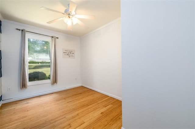 empty room featuring light wood-type flooring, crown molding, and ceiling fan