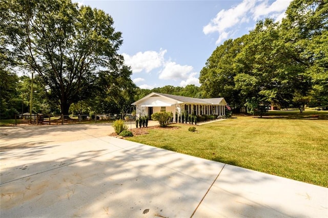 exterior space featuring a front lawn