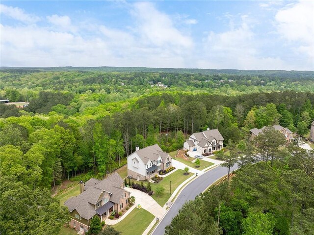 2622 Running River Ct, Lawrenceville, GA 30045 - craftsman house featuring driveway, brick siding, a garage, board and batten siding, and roof with shingles