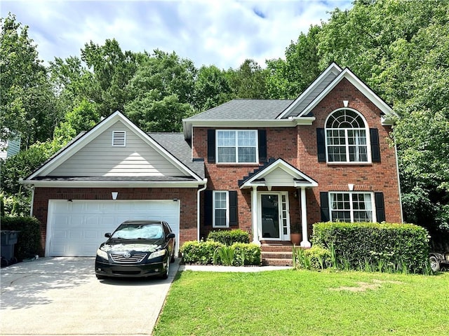 627 Arbour Way, Suwanee, GA 30024 - view of front of property with brick siding, concrete driveway, a front lawn, and an attached garage