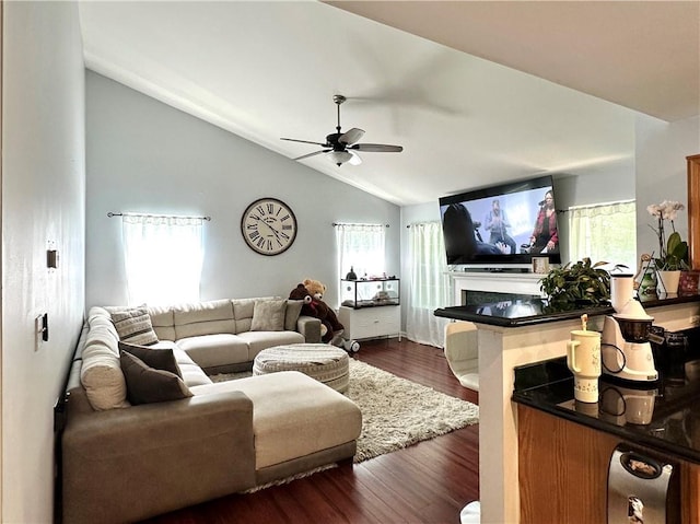 627 Arbour Way, Suwanee, GA 30024 - living area with plenty of natural light, a ceiling fan, lofted ceiling, and dark wood finished floors