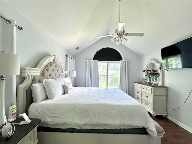 627 Arbour Way, Suwanee, GA 30024 - bedroom featuring dark wood-style floors, vaulted ceiling, a ceiling fan, and baseboards