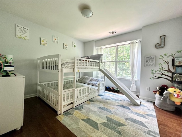 627 Arbour Way, Suwanee, GA 30024 - bedroom featuring wood finished floors and baseboards