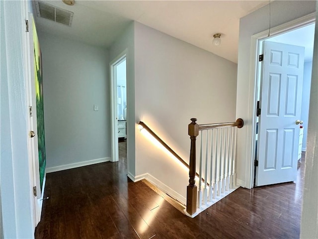 627 Arbour Way, Suwanee, GA 30024 - hallway with an upstairs landing, dark wood-type flooring, and baseboards