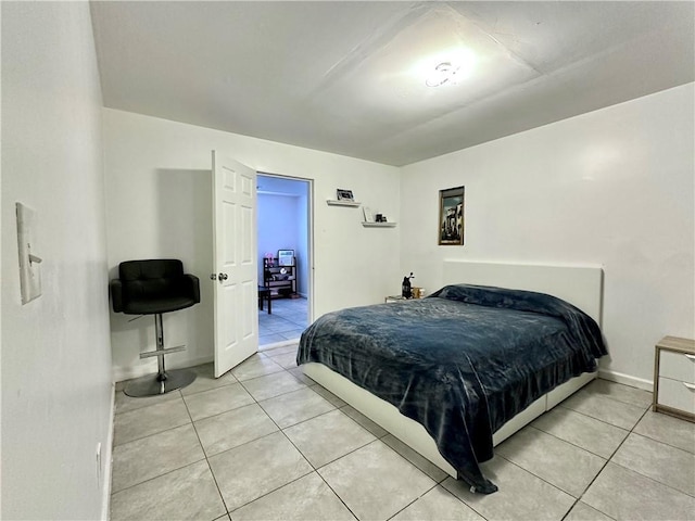 627 Arbour Way, Suwanee, GA 30024 - bedroom with light tile patterned floors and baseboards