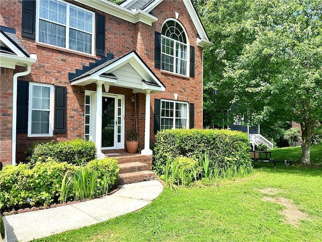 627 Arbour Way, Suwanee, GA 30024 - view of front of home featuring a front lawn and brick siding