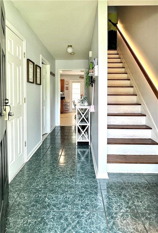 627 Arbour Way, Suwanee, GA 30024 - stairs with tile patterned flooring and baseboards