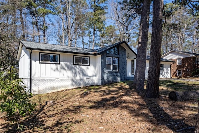 view of front of home featuring crawl space