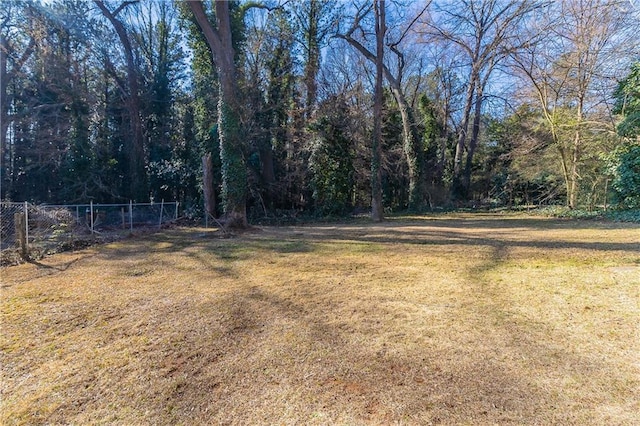 view of yard featuring fence