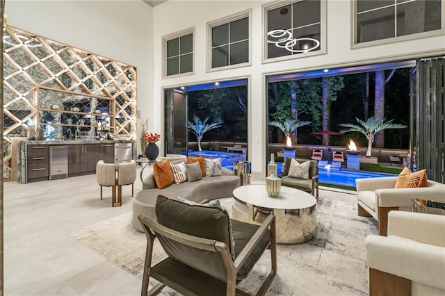 interior space featuring an outdoor hangout area, area for grilling, and an outdoor pool