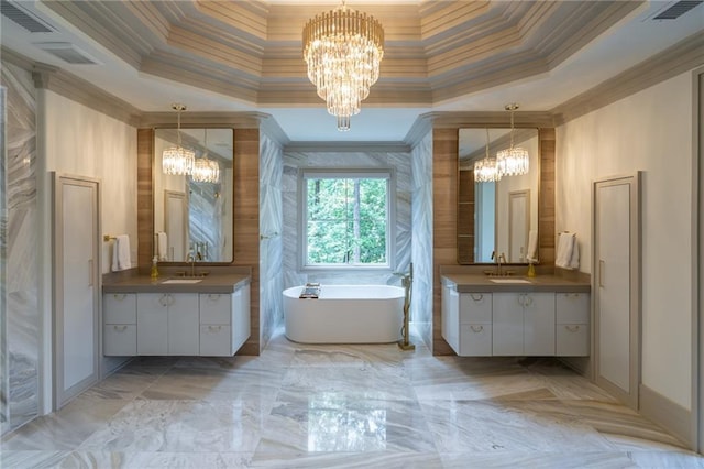 bathroom with visible vents, a sink, and an inviting chandelier