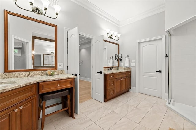 bathroom with a tile shower, a sink, two vanities, ornamental molding, and a notable chandelier