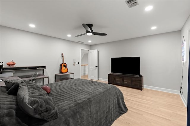 bedroom with recessed lighting, visible vents, light wood-style flooring, and baseboards