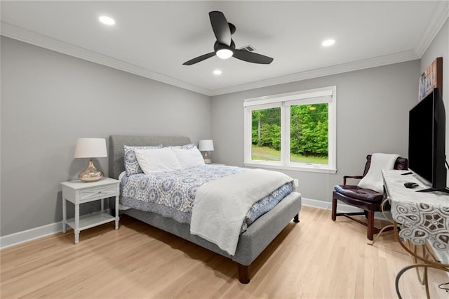 bedroom with light wood-style floors, recessed lighting, ornamental molding, and baseboards