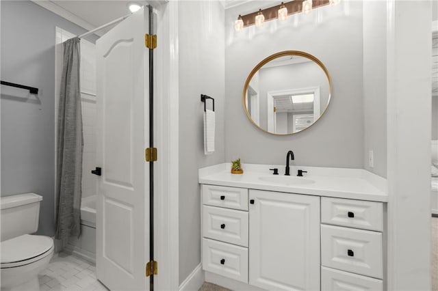bathroom with shower / bath combo, vanity, and toilet