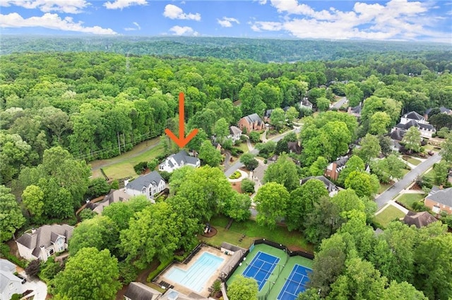 aerial view featuring a view of trees