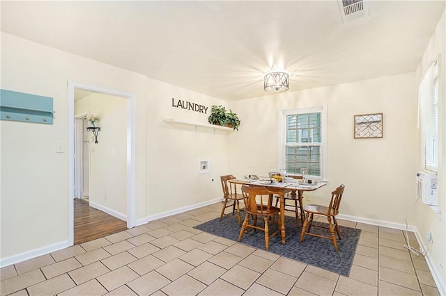 view of tiled dining space