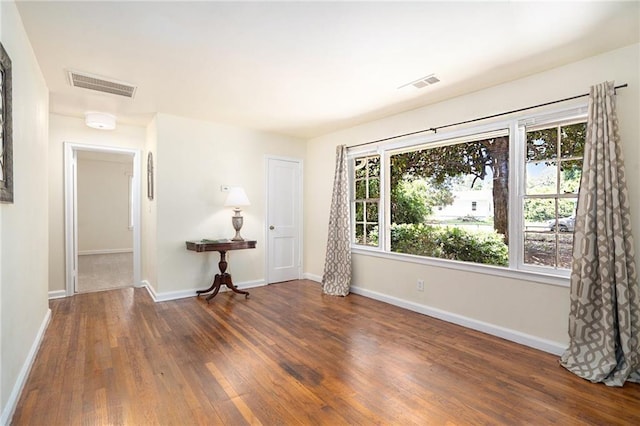 empty room featuring dark hardwood / wood-style floors