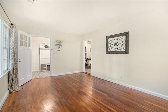 spare room featuring hardwood / wood-style flooring