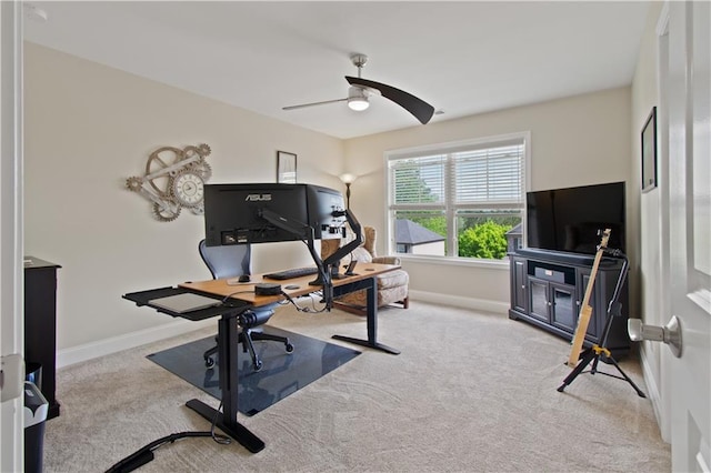 workout area featuring baseboards, carpet flooring, and ceiling fan